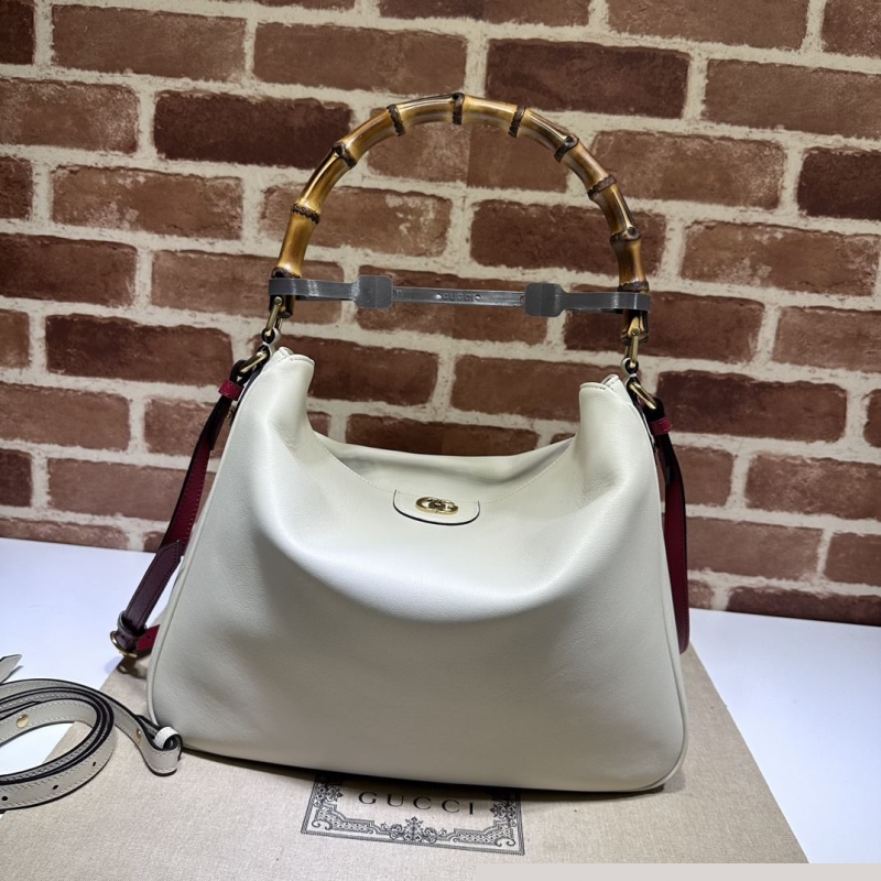 G*u*i top handle bags